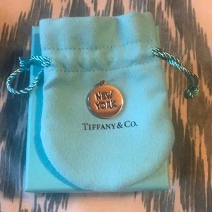 Round “New York” charm by Tiffany & Co.   BrandNew